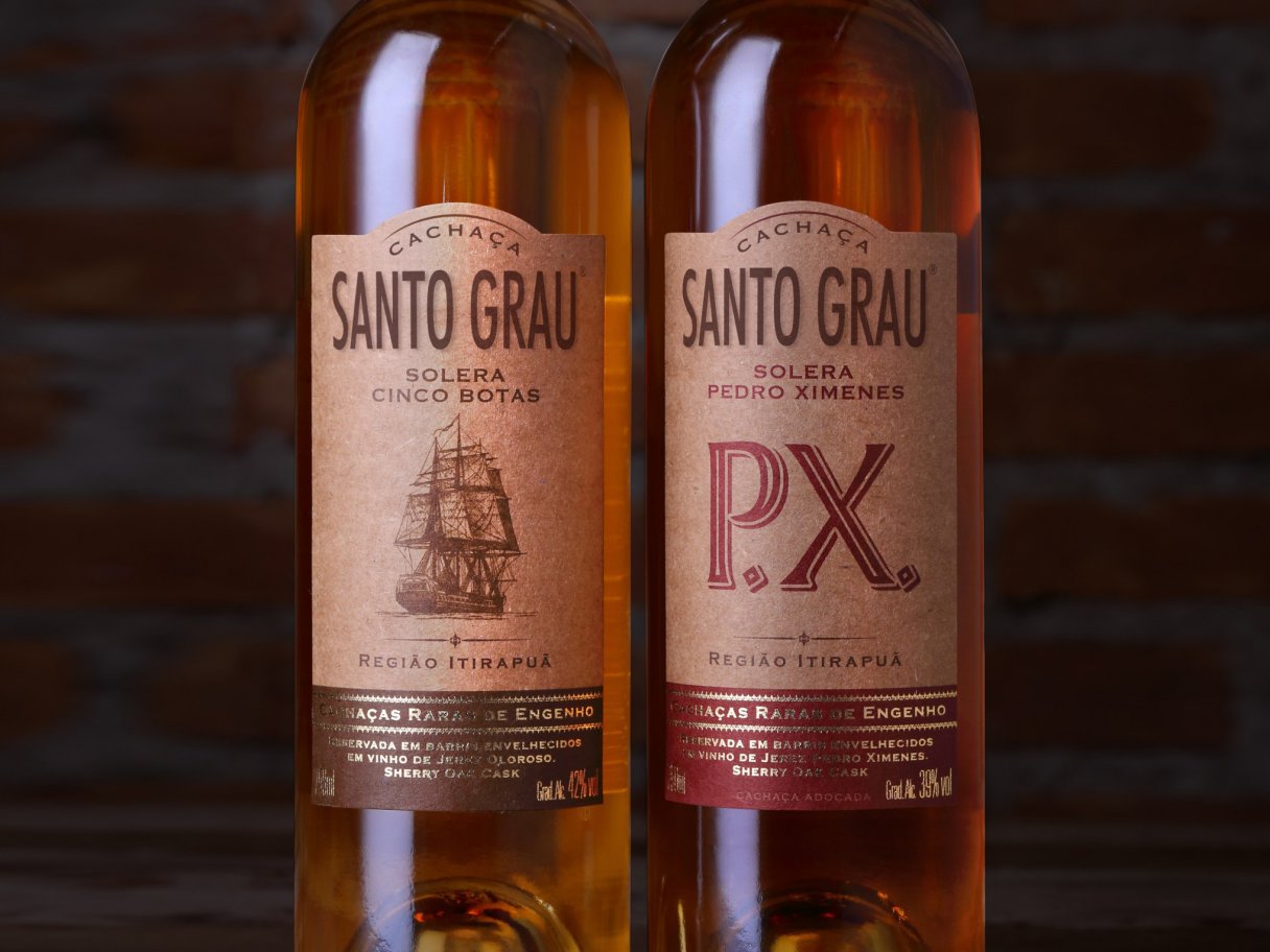 Rooftops of a coastal town with the sea in background