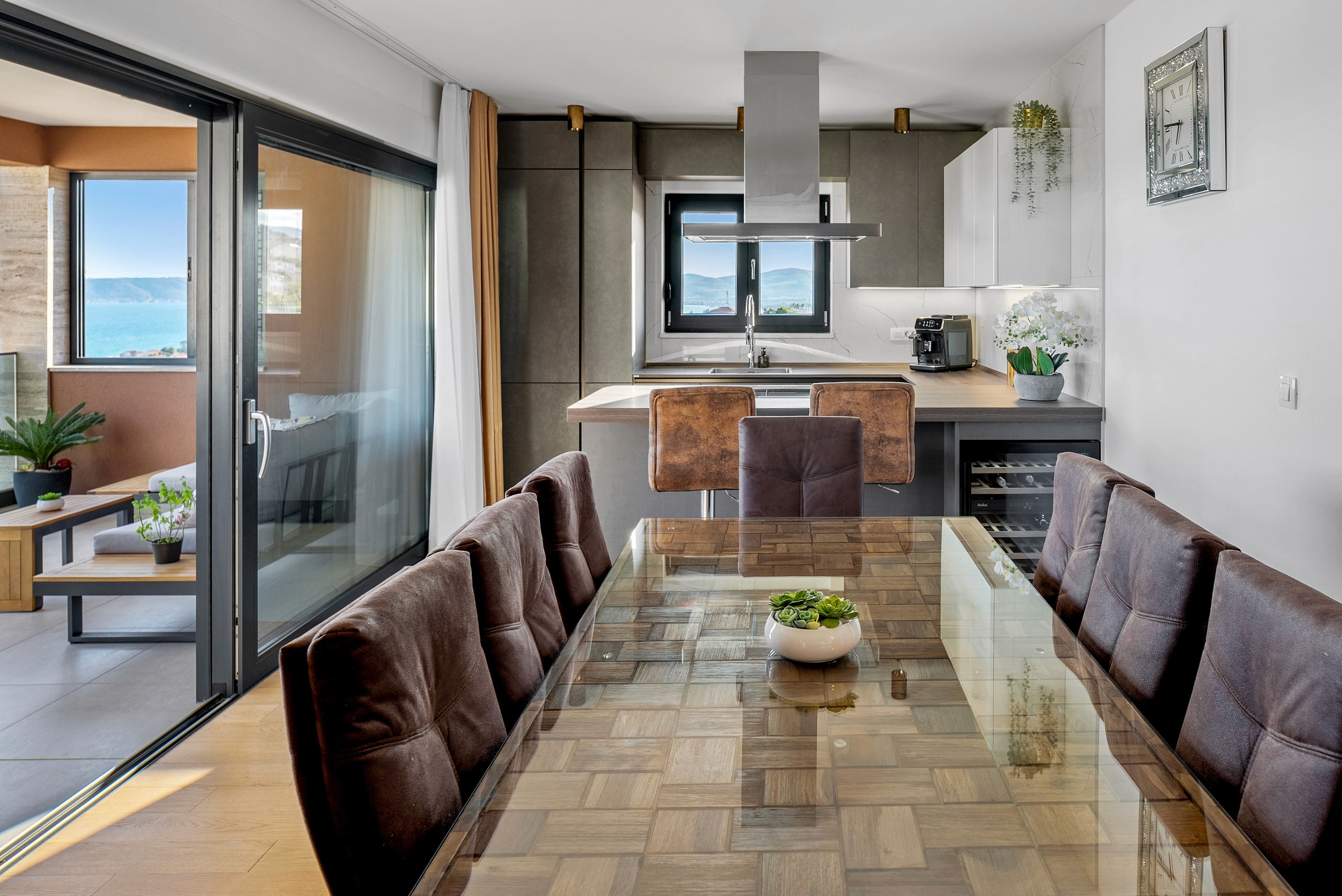 Ornate classic bathroom with claw-foot tub and wood paneling.