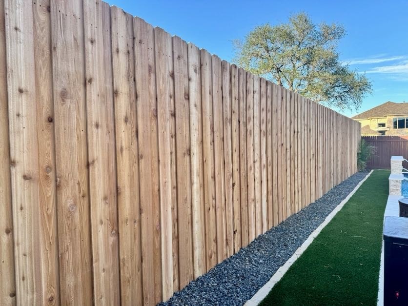Board-on-board cedar fence