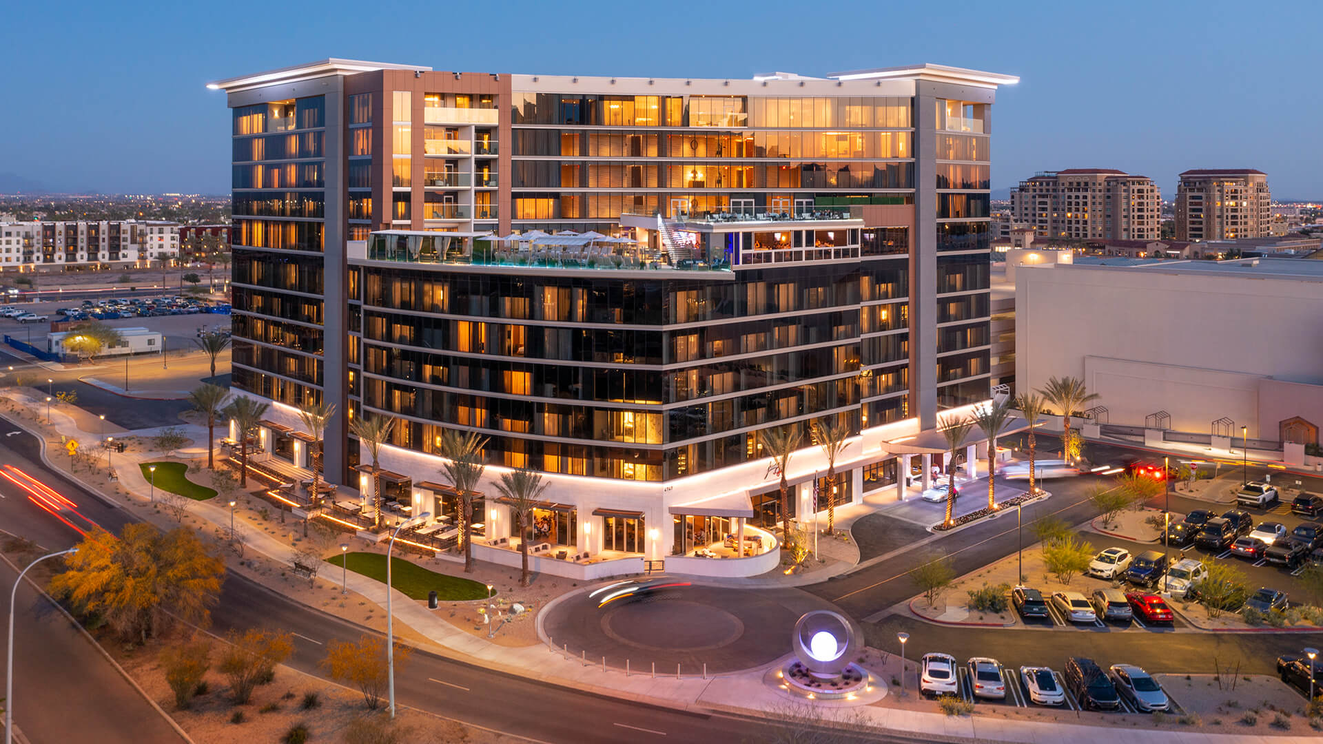 a black and white living room with a large tv