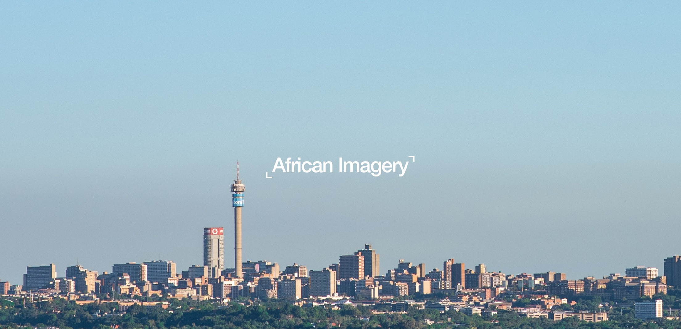 The Johannesburg cityscape with "African Imagery" in the center