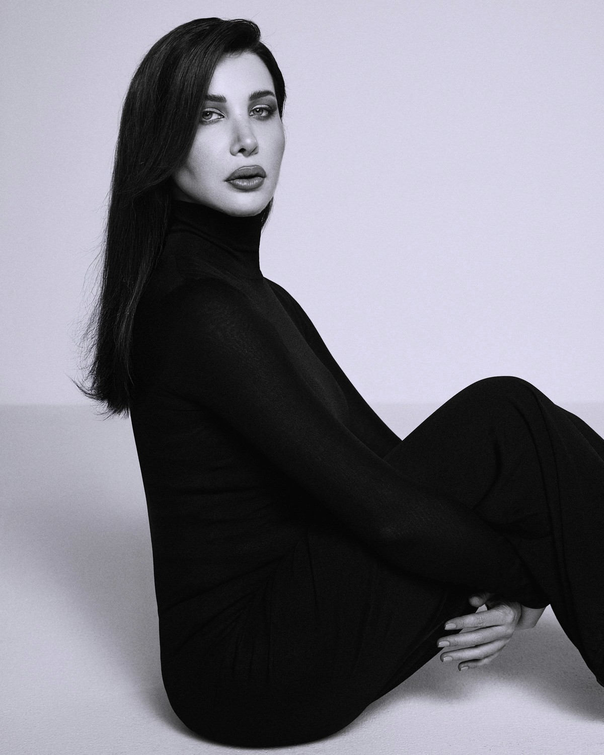 Nancy Ajram in Alaïa dress and Cartier jewelry