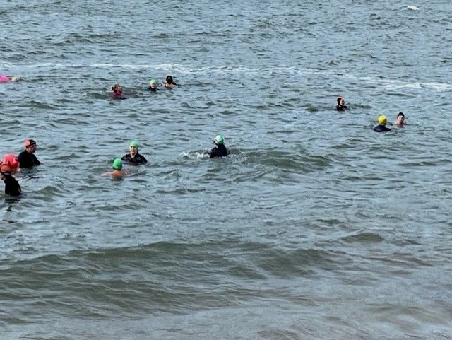 Dunmore East Swim Club swim class in open water