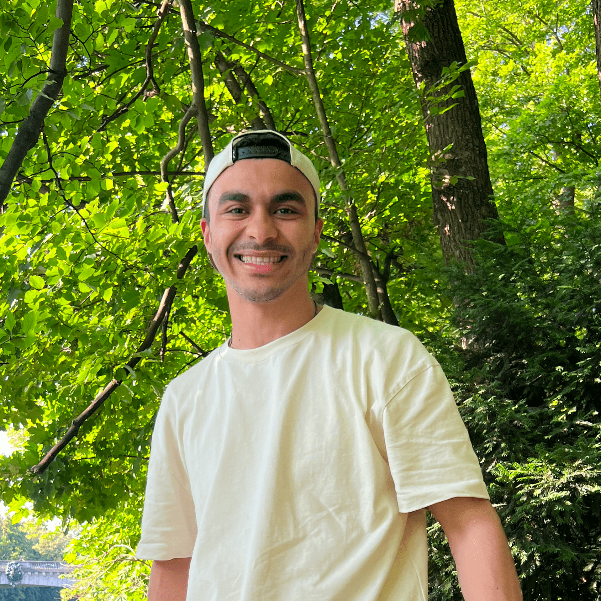 Mneim hiking and smiling to the camera