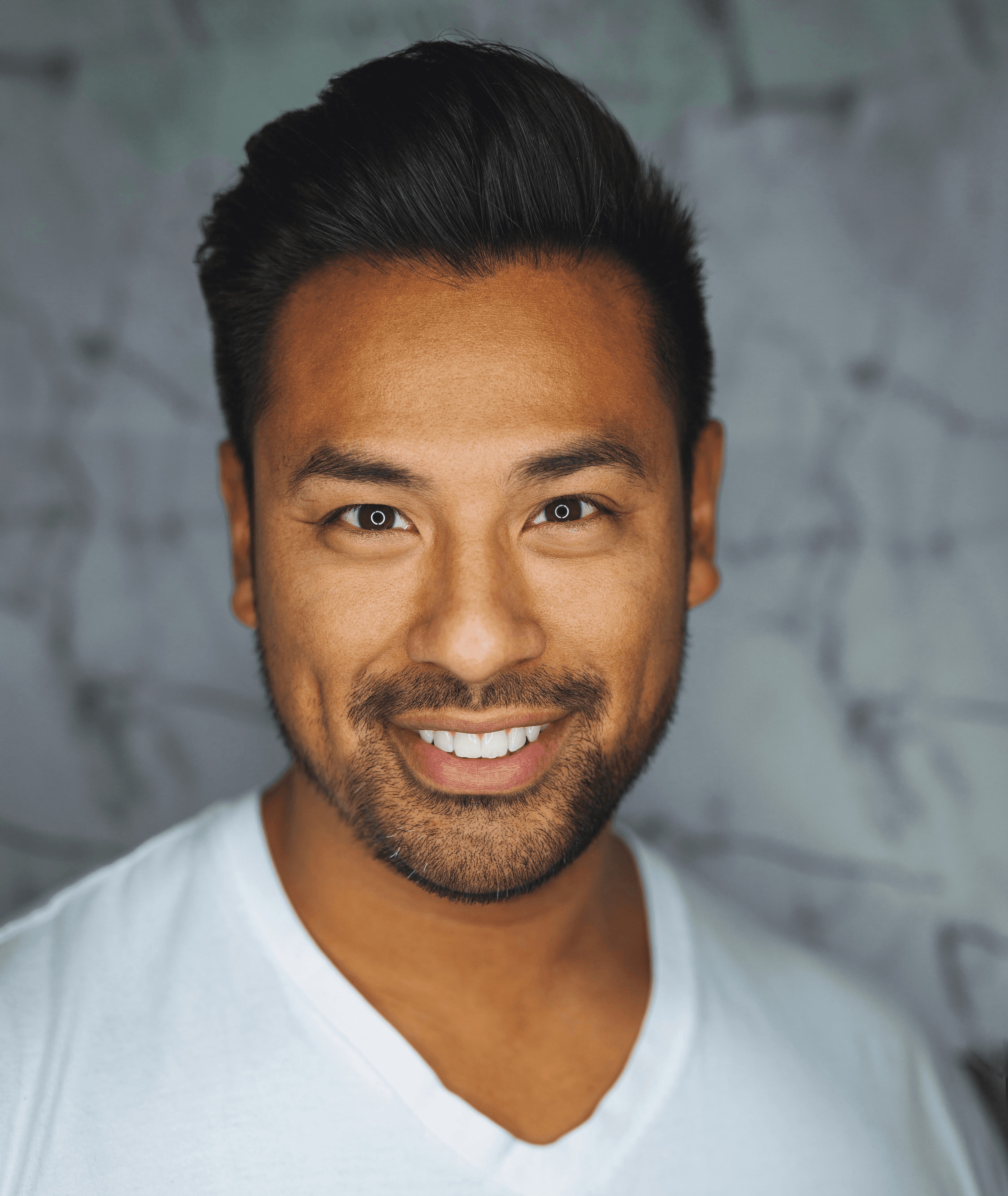 man wearing white V-neck shirt