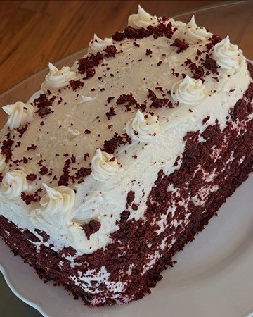 Red velvet cake with white cream cheese frosting