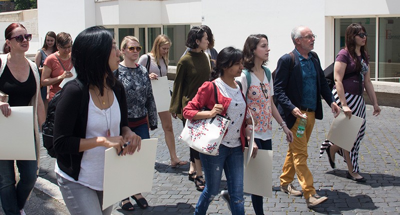 group of people walking in the street