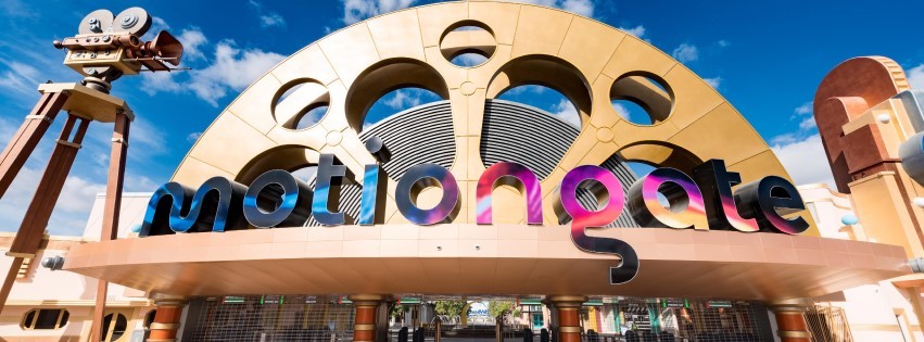 A giant signage of Motiongate Dubai with film-inspired decorations and sculptures, part of things to do in Dubai with family.