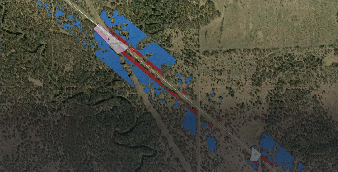 Satellite map view with overlaid red and blue spatial data patterns