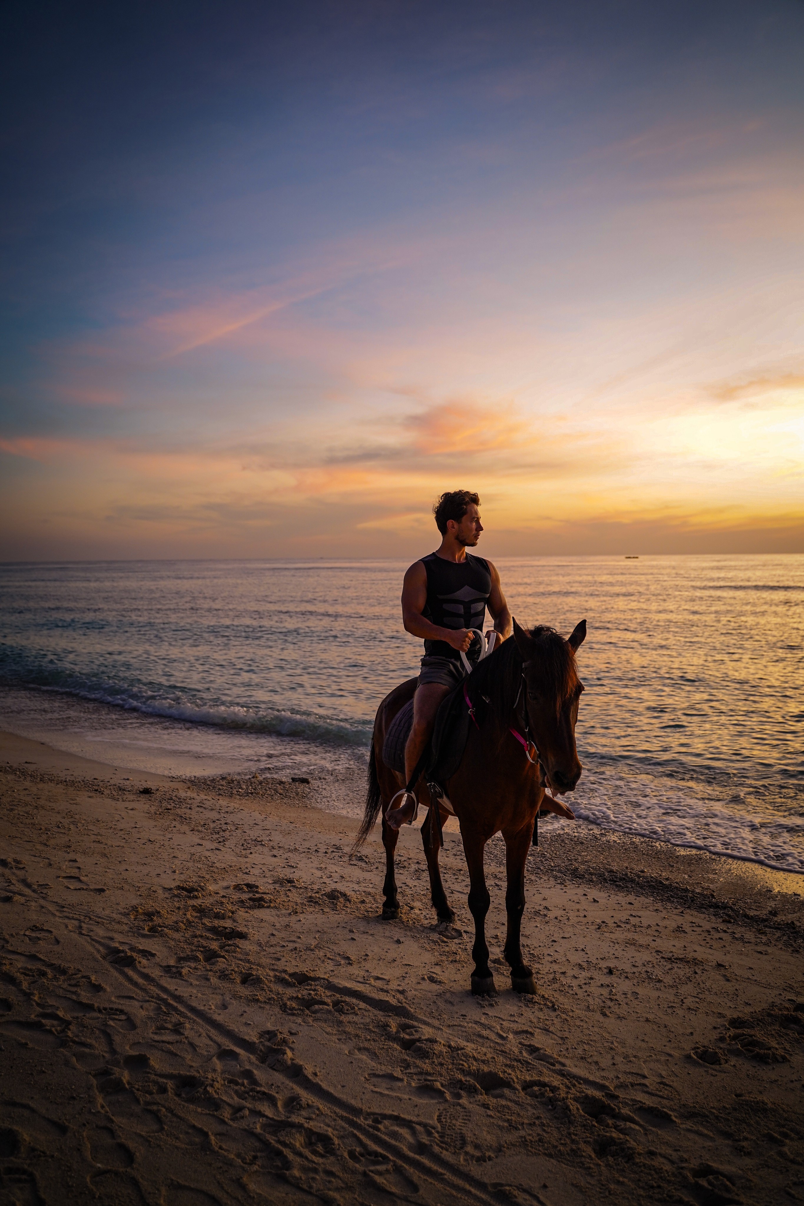 Horse riding on beach