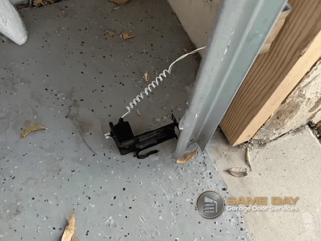 Sensor knocked off track-door would not go down