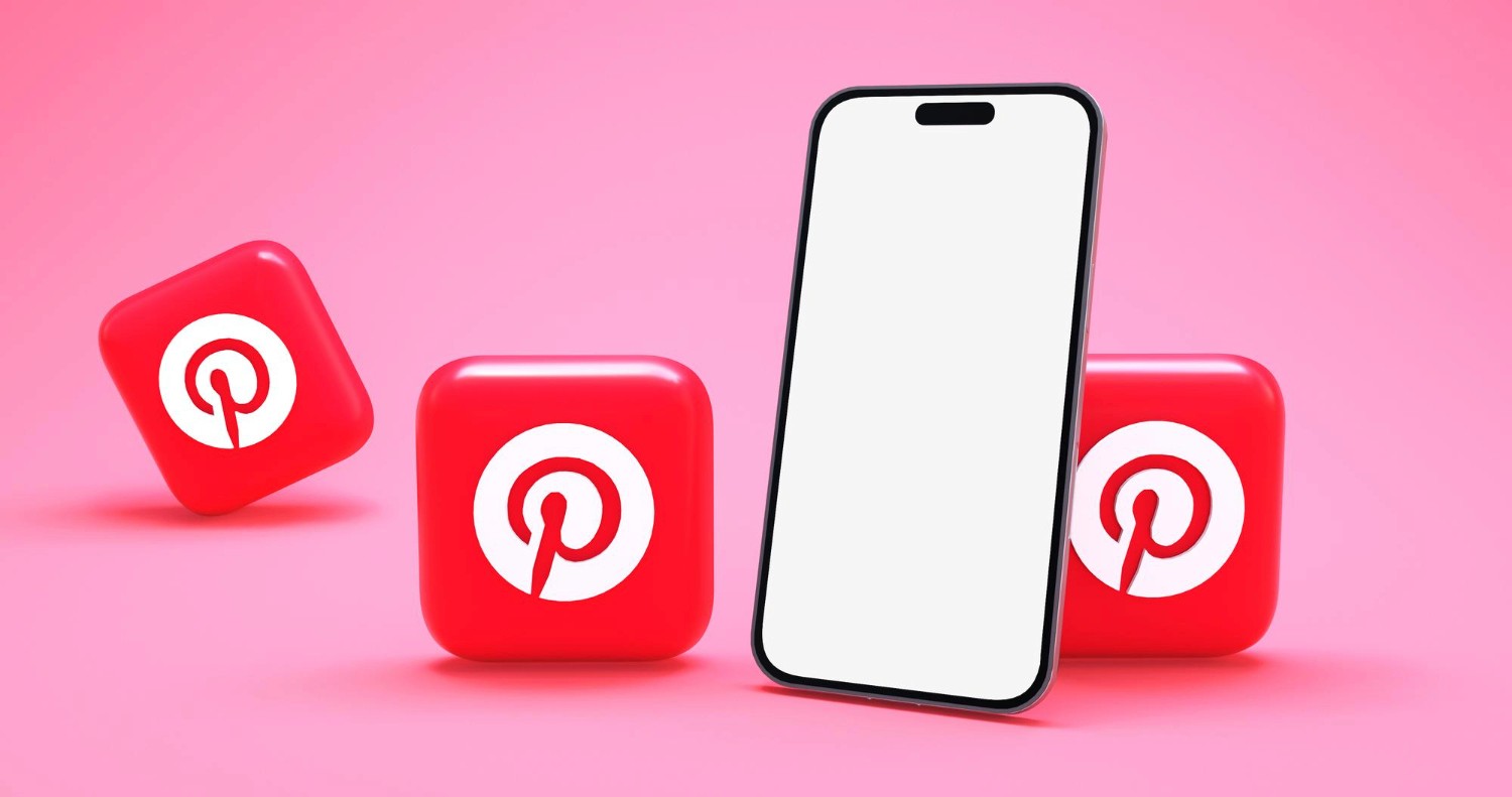 Pinterest logo displayed prominently on a pink background, symbolizing creativity and inspiration in a vibrant setting.