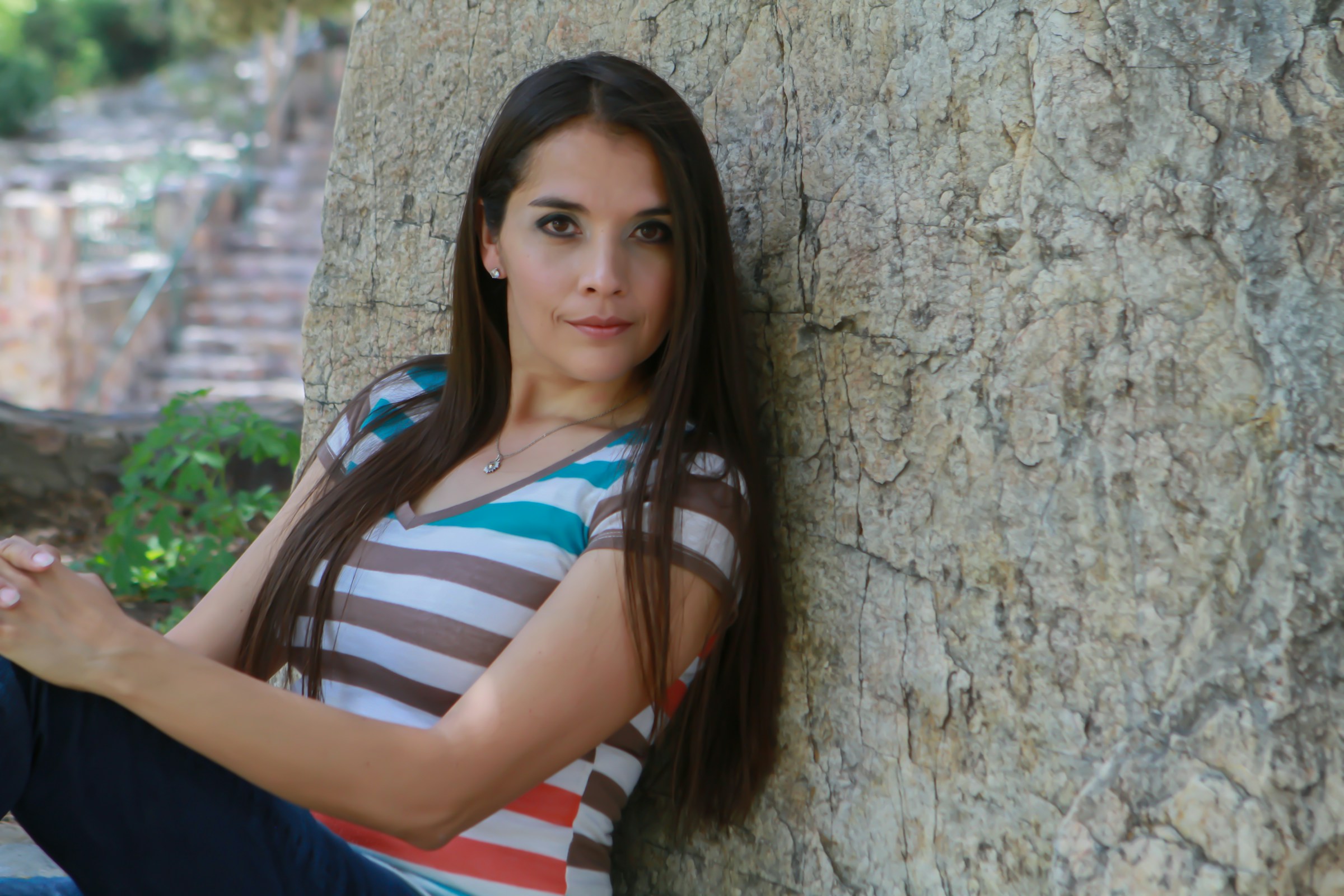 woman sitting near a wall - Color Wheel for Clothes