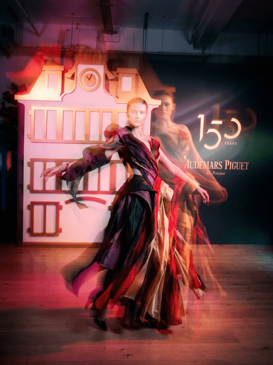 Shiba Inu dog jumping to catch falling autumn leaves