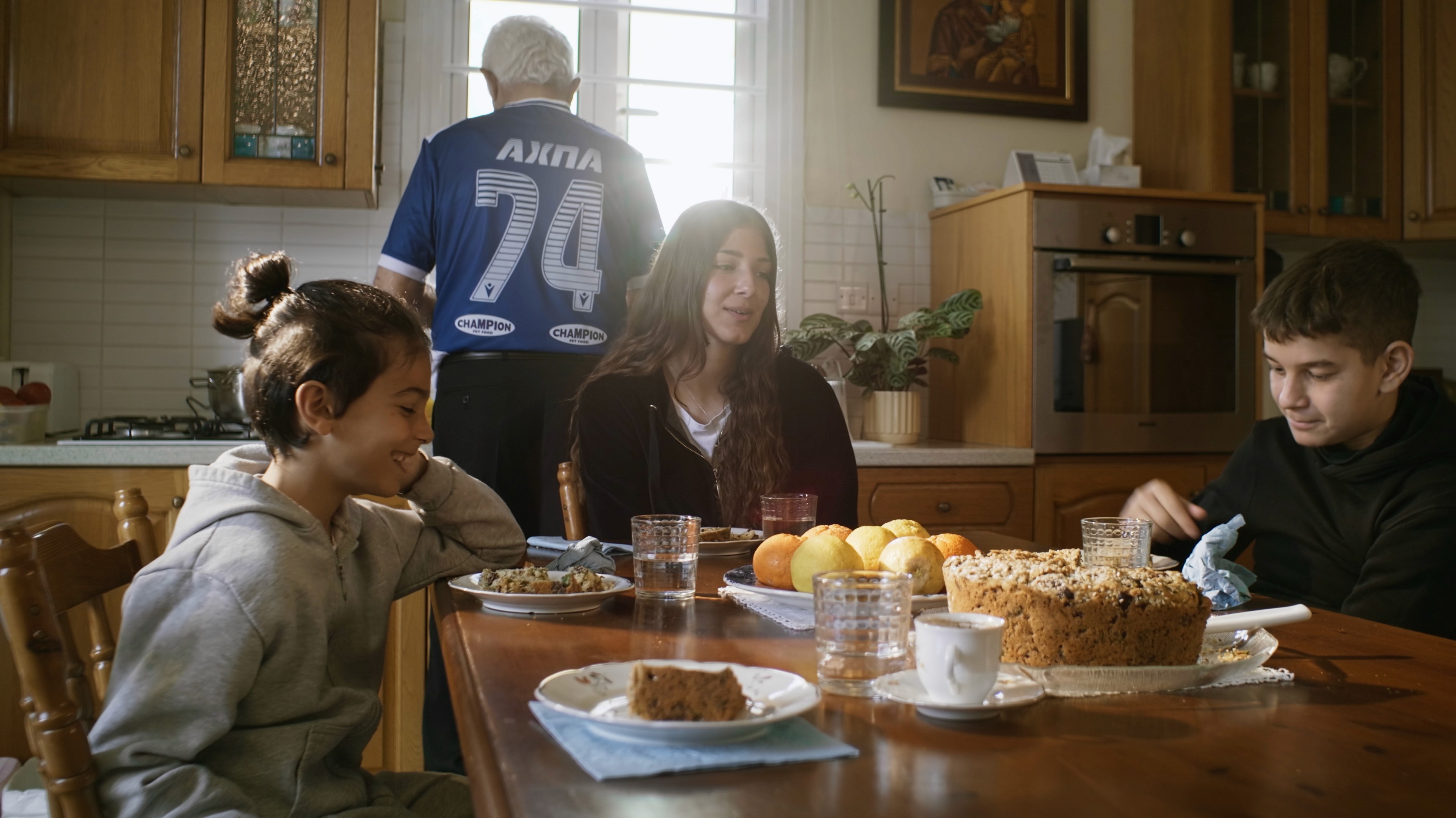 Children are sitting around the table