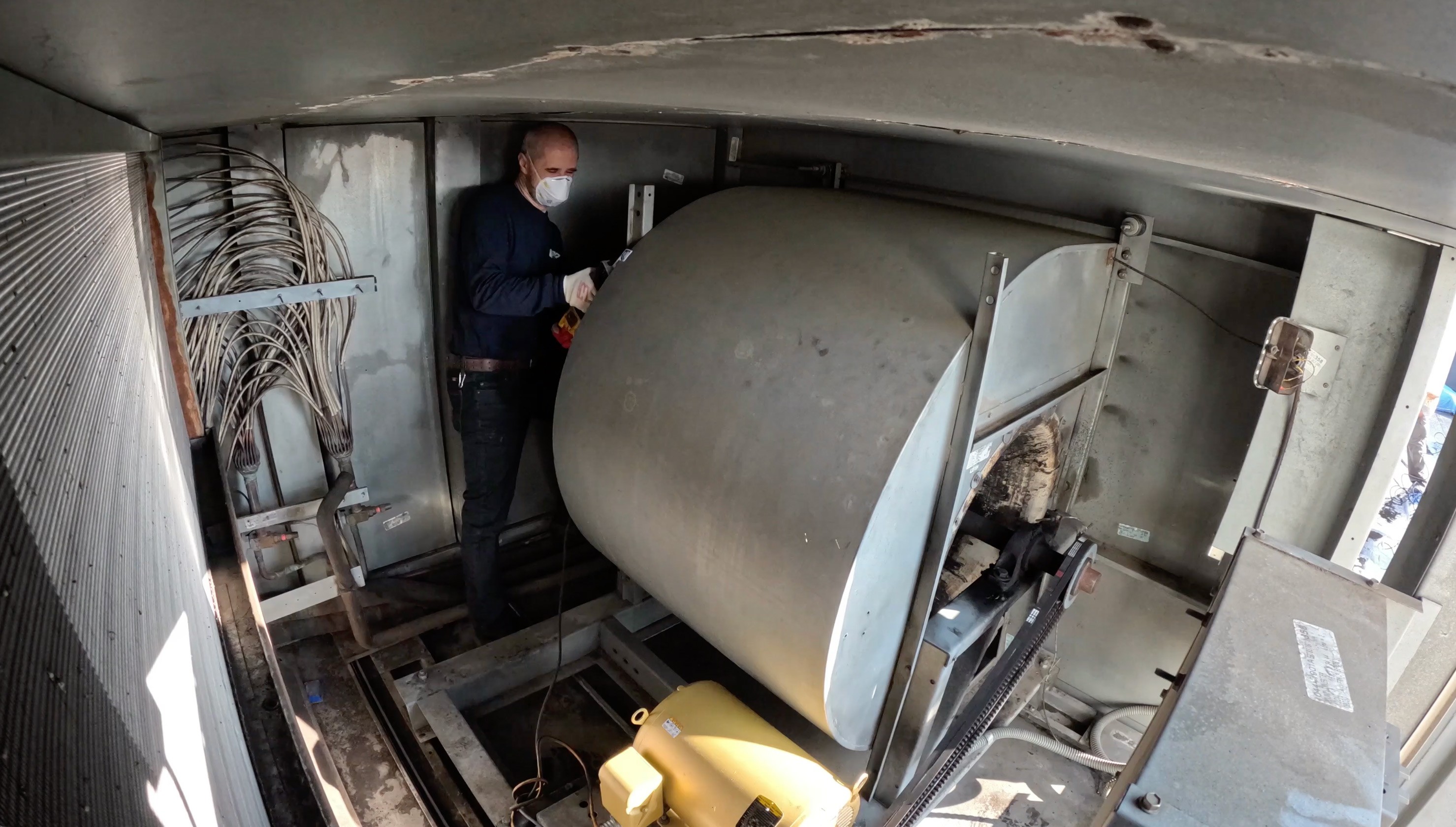 Existing legacy supply fan inside a hospital air handling unit before emergency fan array retrofit by GRR Cooling Experts in NYC