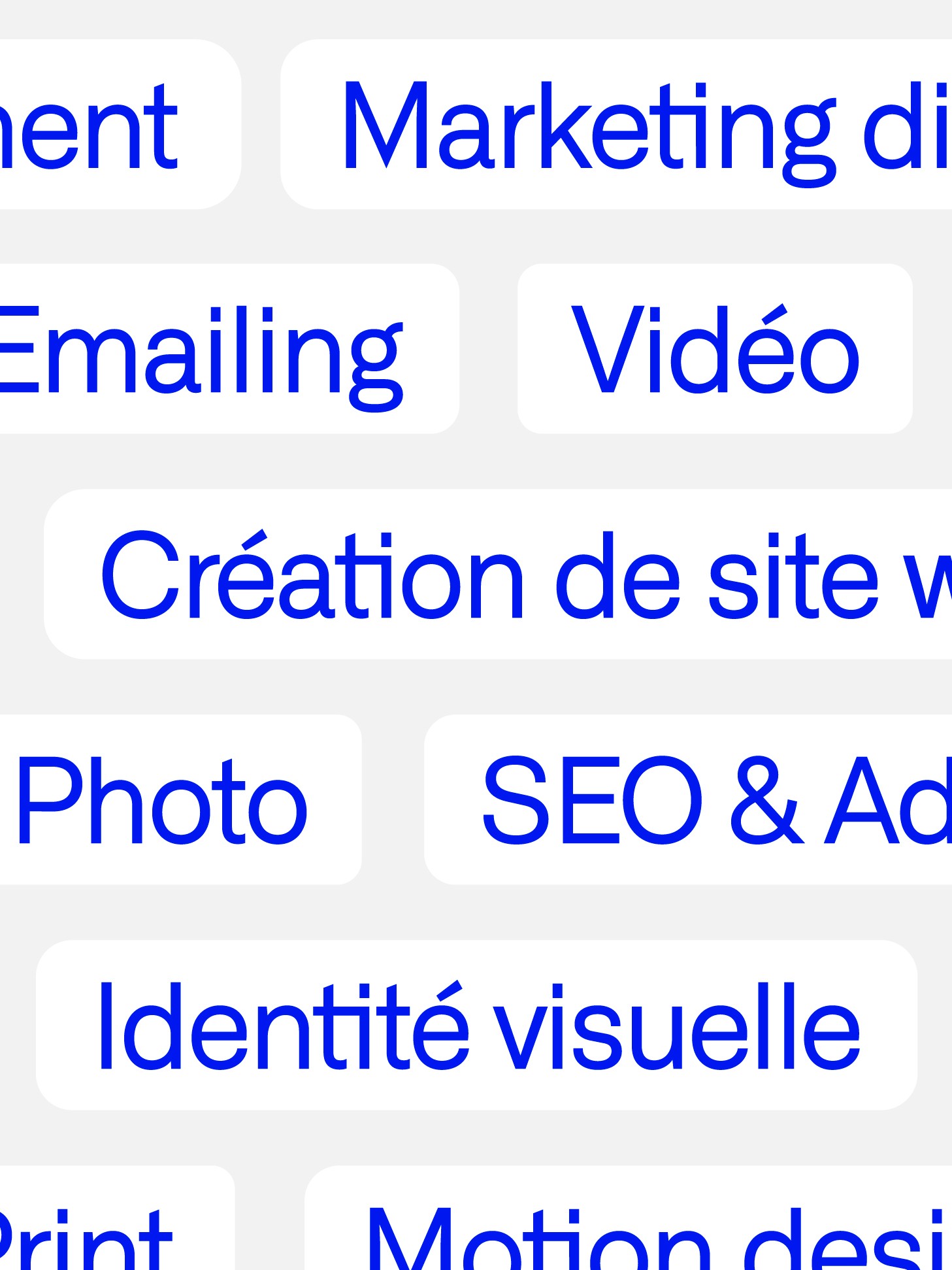 Modern home office setup with a monitor, ergonomic chair, keyboard, and indoor plants near a window with blinds.