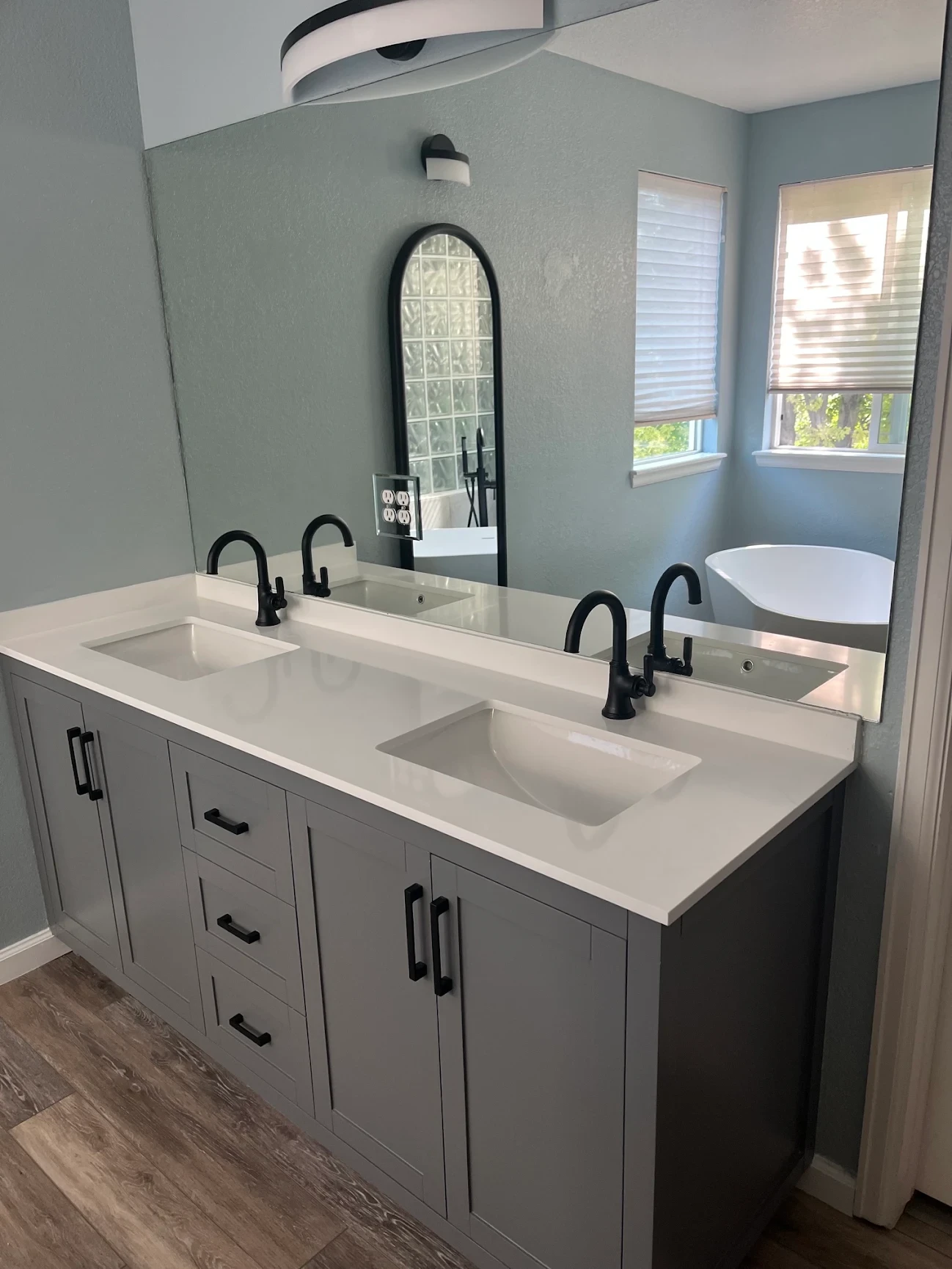 white ceramic sink with faucet