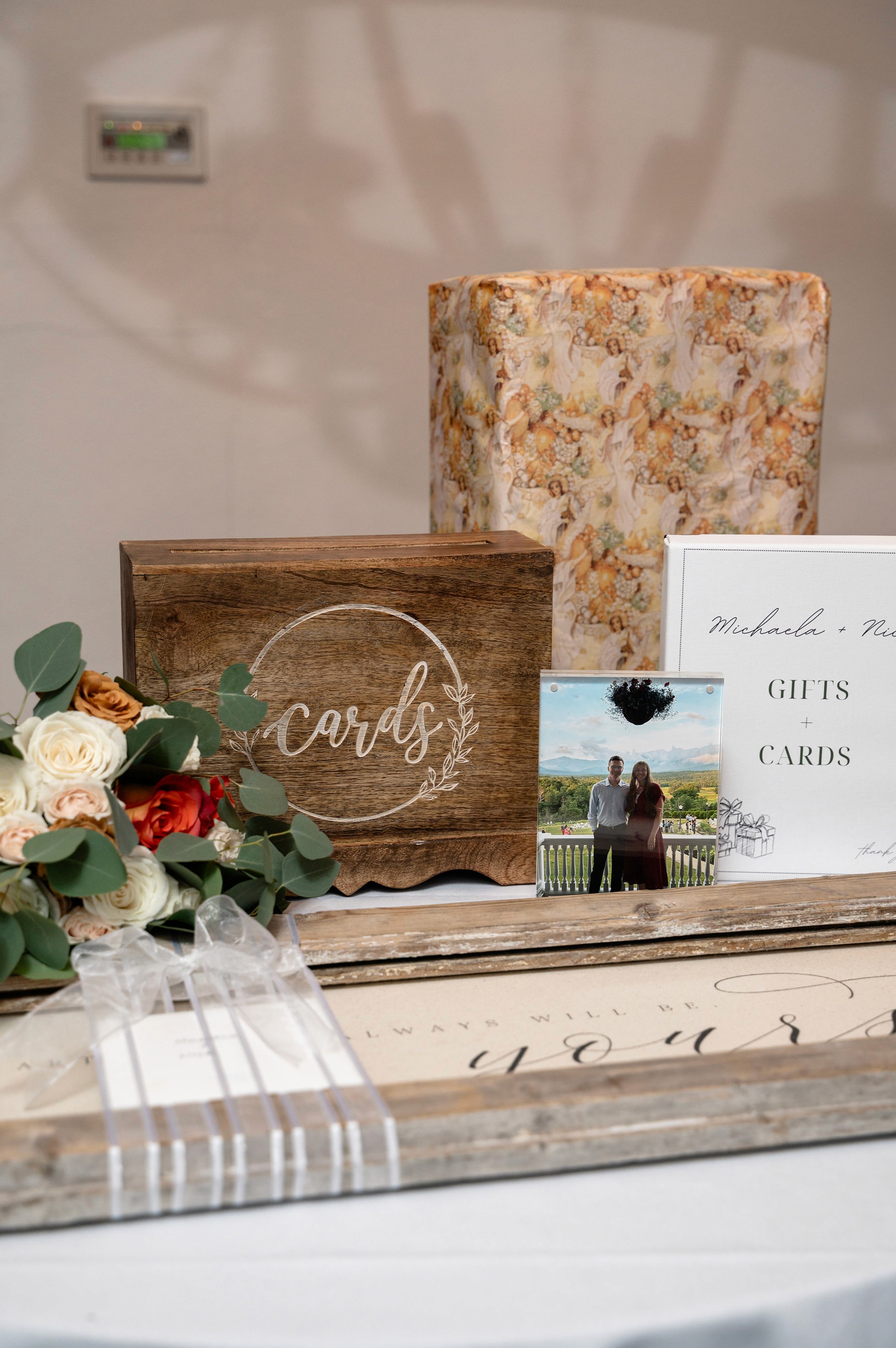 Flat lay wedding details with bouquet, rings, and sparkling bridal heels