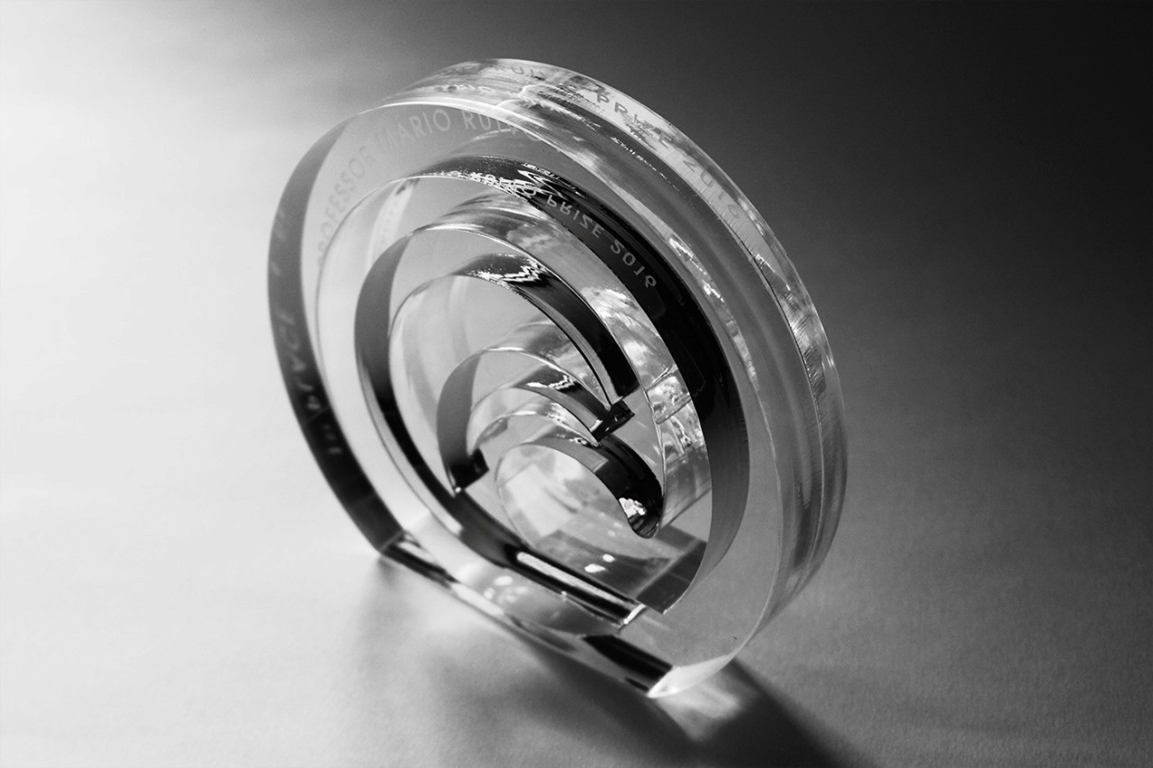 an image of an acrylic trophy shaped in the form of a wave