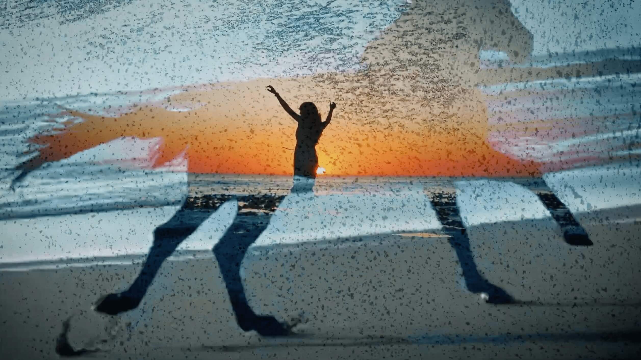 a woman holding a red flower