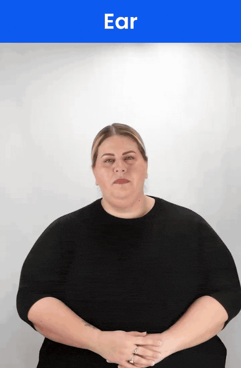 Animated GIF: a Deaf signer signs EAR in ASL, the index finger touching the earlobe.