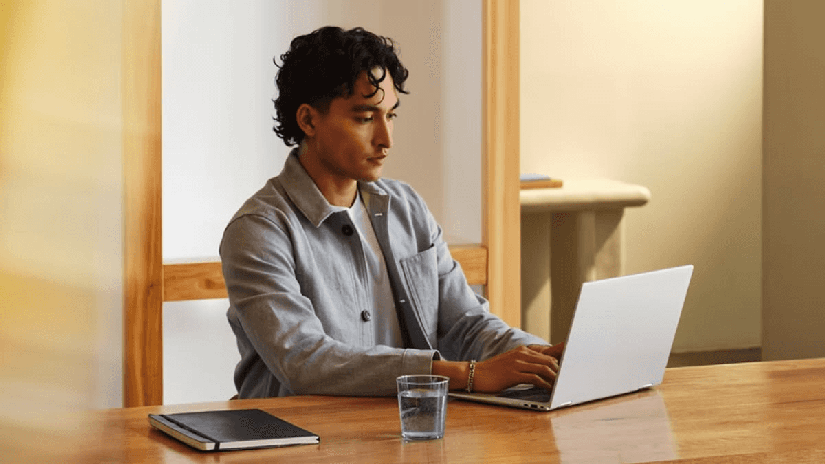 Developer working on a fintech API integration at a laptop