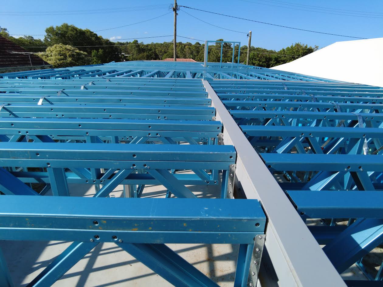 Ohana plumbing clearing a blocked drain from the street.