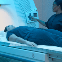 Member undergoing cardiovascular screening as part of a comprehensive health check within a longevity health services program.