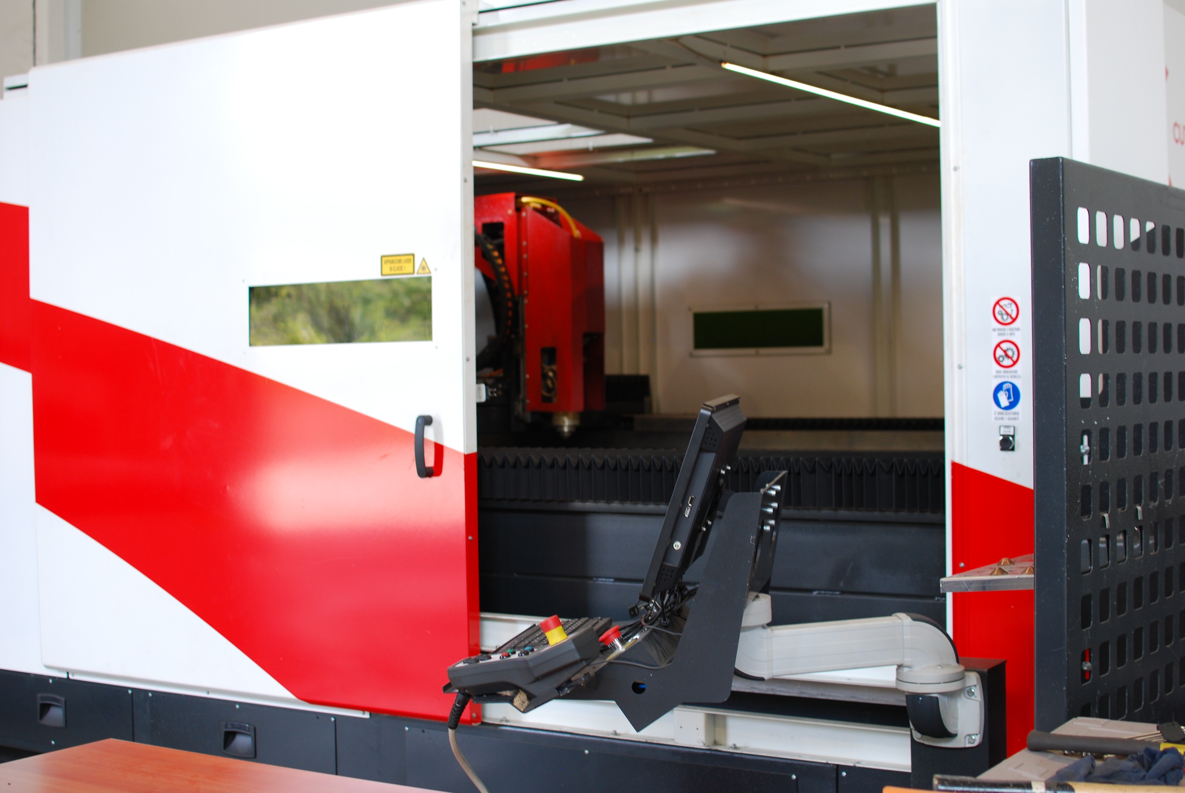 welder working on a piece of metal in a factory