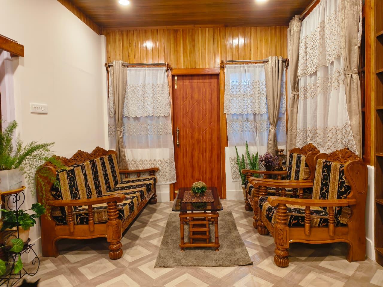 black and brown wooden table with chairs