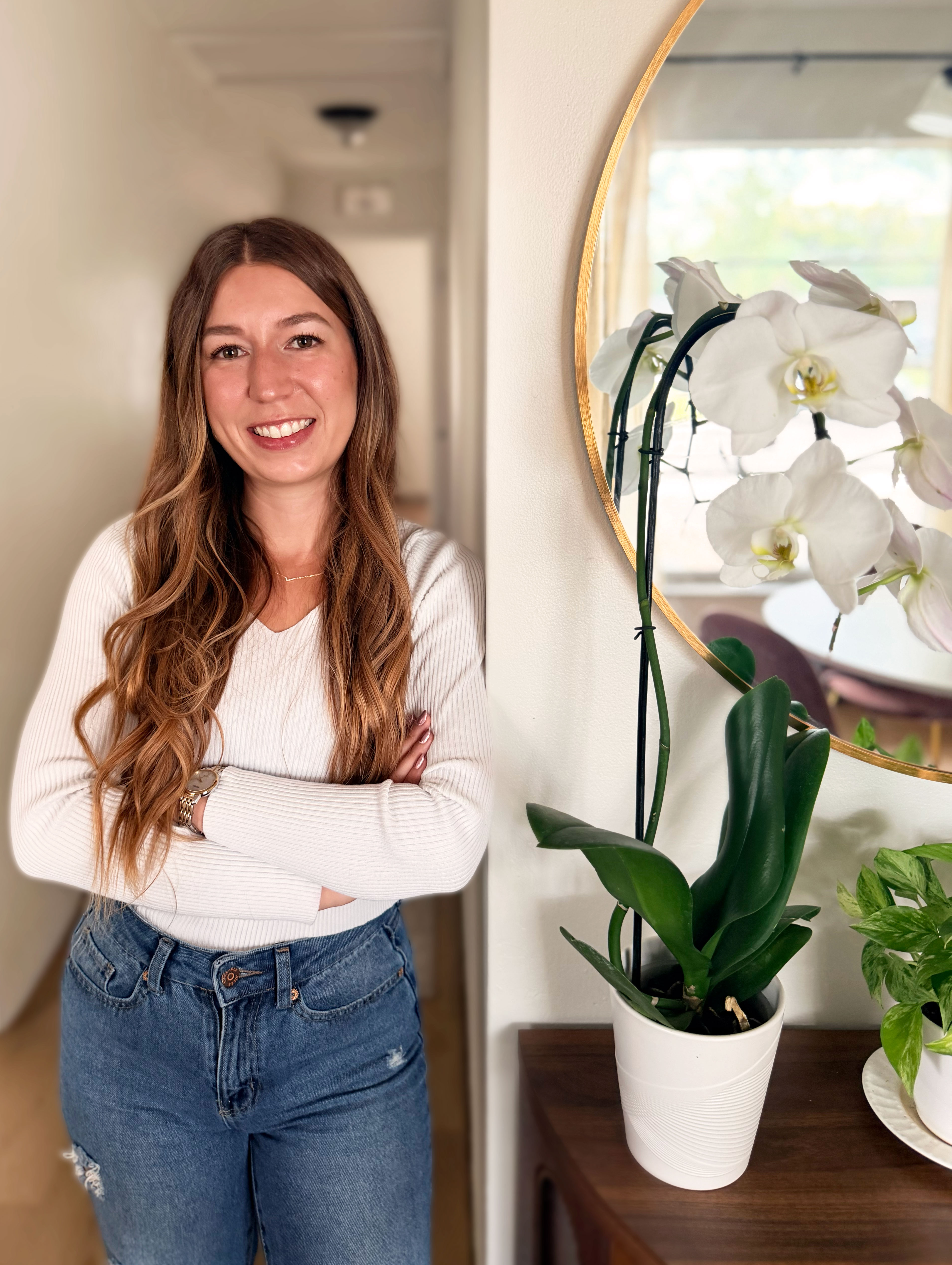 Julie Morris, Tampa Bay Realtor®, standing indoors and smiling