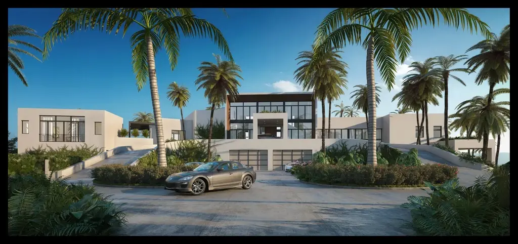 Front entry of luxury hillside estate with double garage and palm tree driveway, St. Lucia