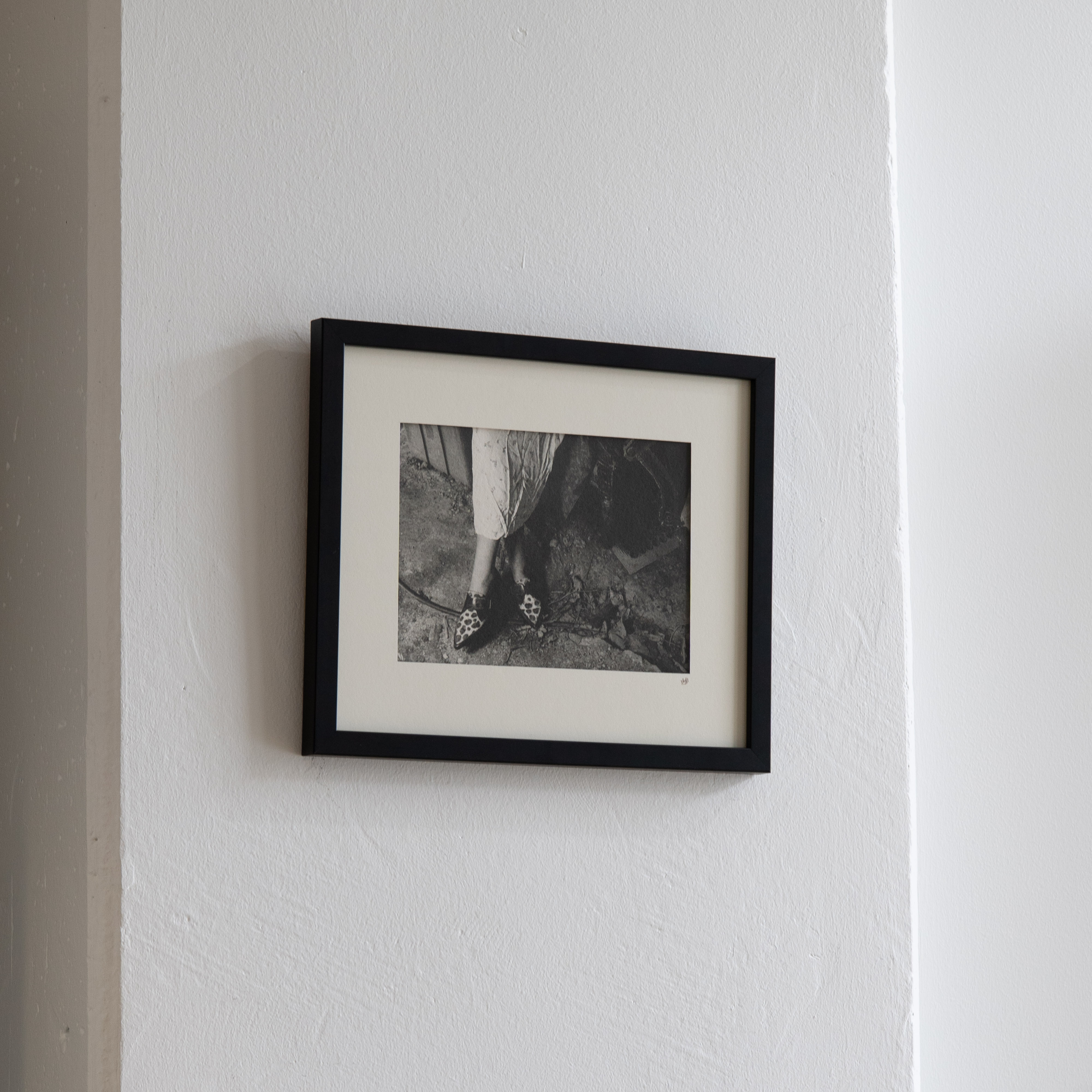 Darkroom prints drying on wire racks