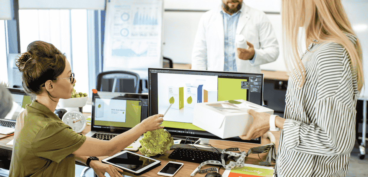 Three professinoals discussing branding strategy