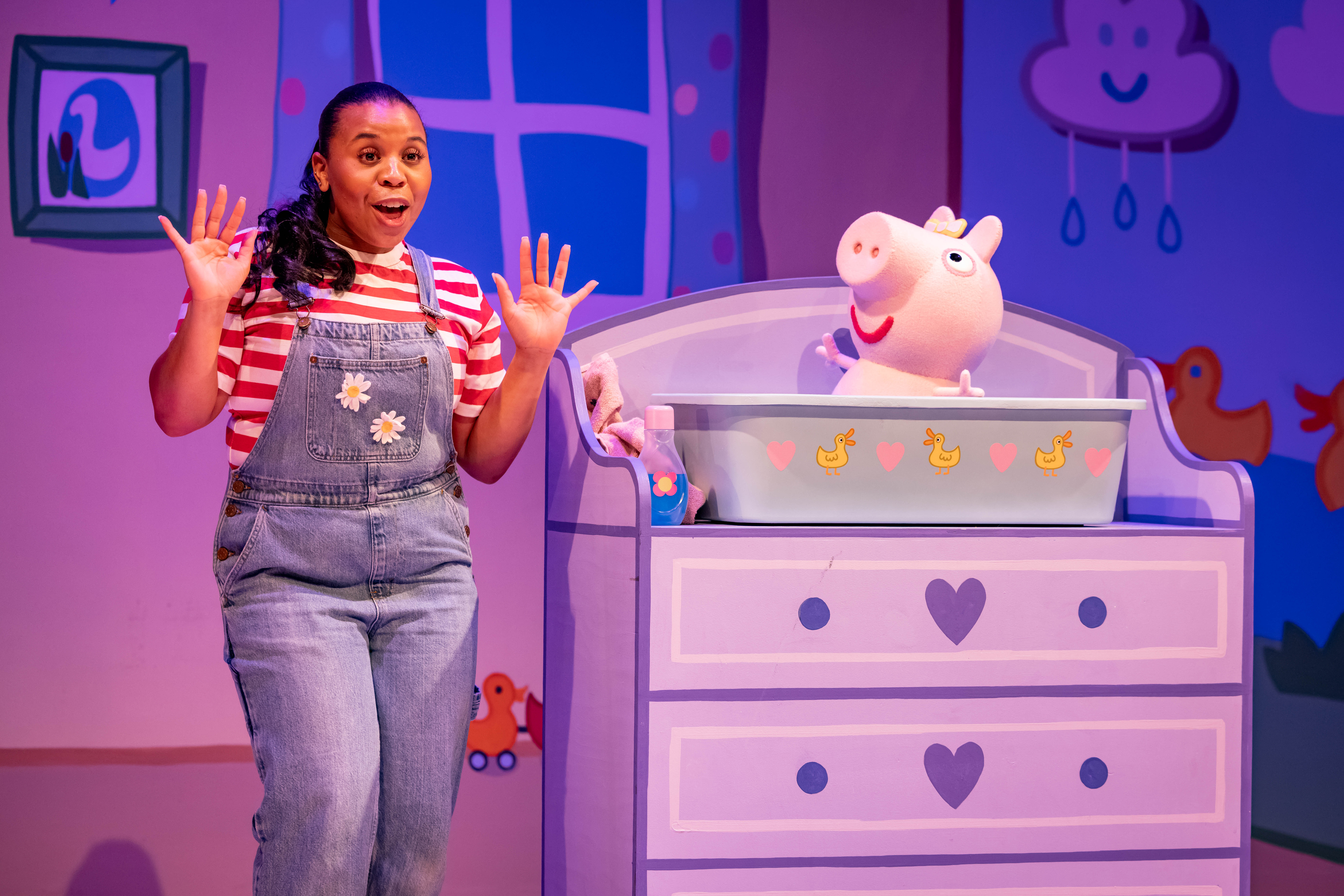 Peppa Pig’s Big Family Show performer with Peppa in a playful nursery scene.