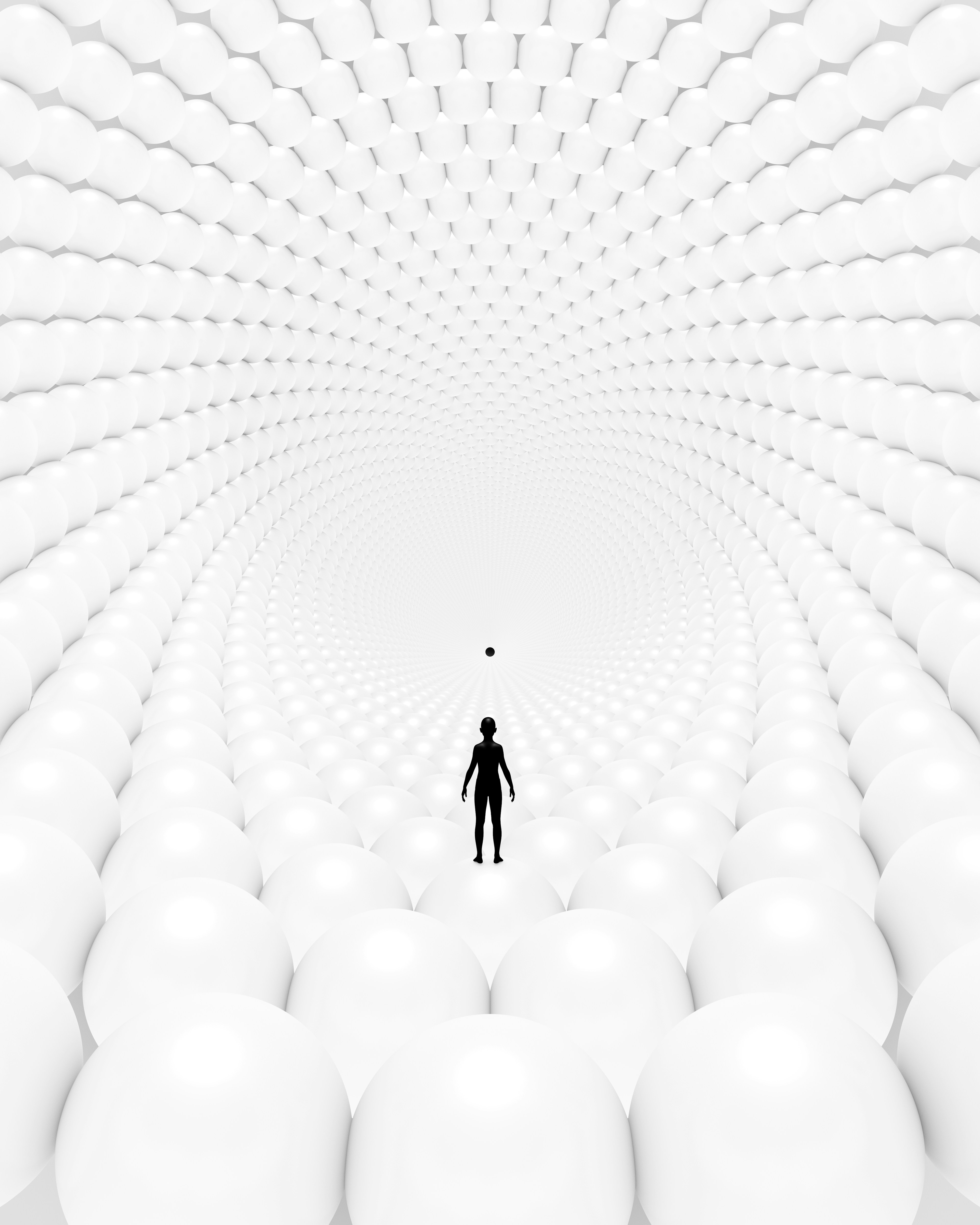 Silhouette of a person in a white, spherical tunnel.