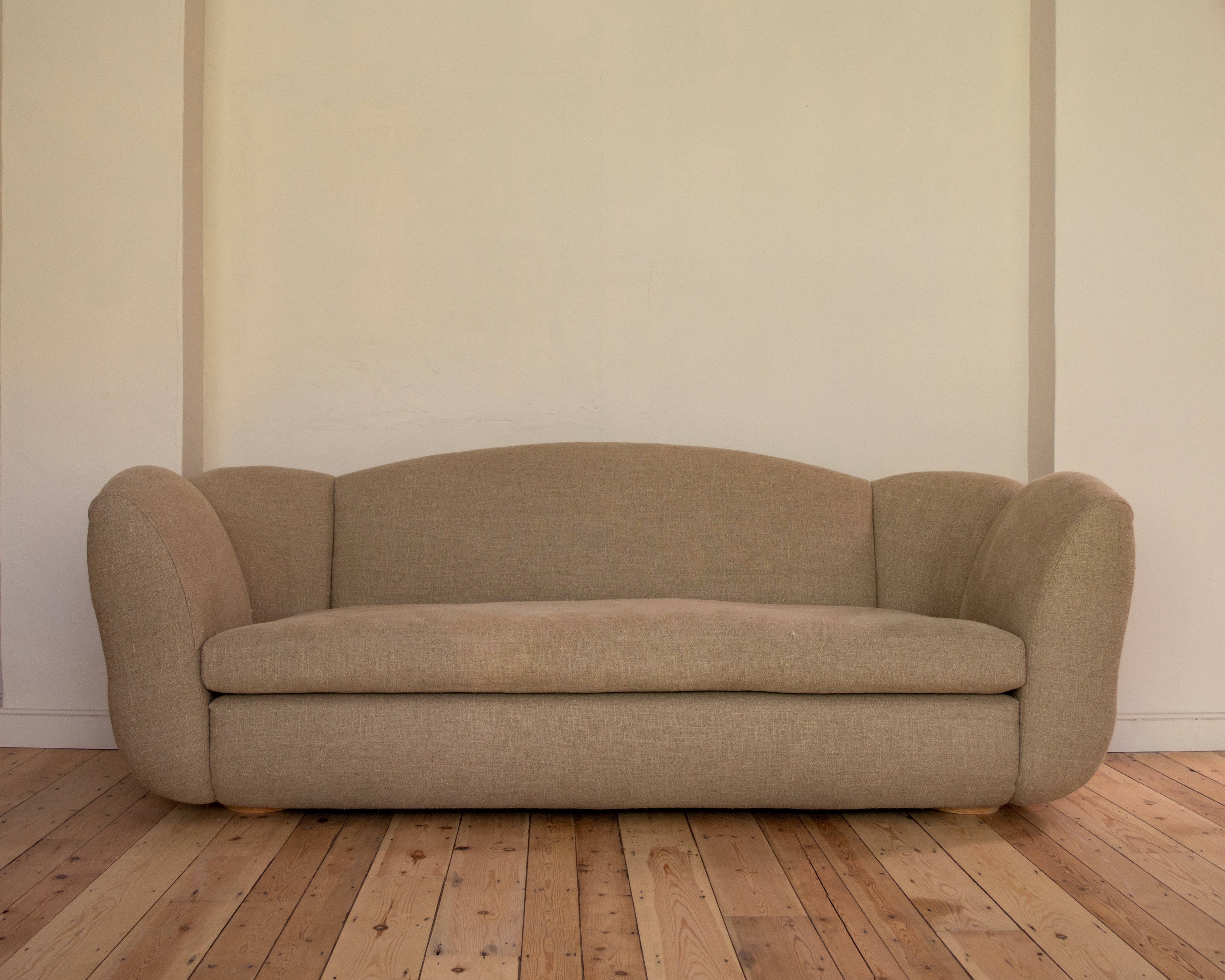 Wilkinson & Rivera Bay Sofa in Raw Linen in showroom setting