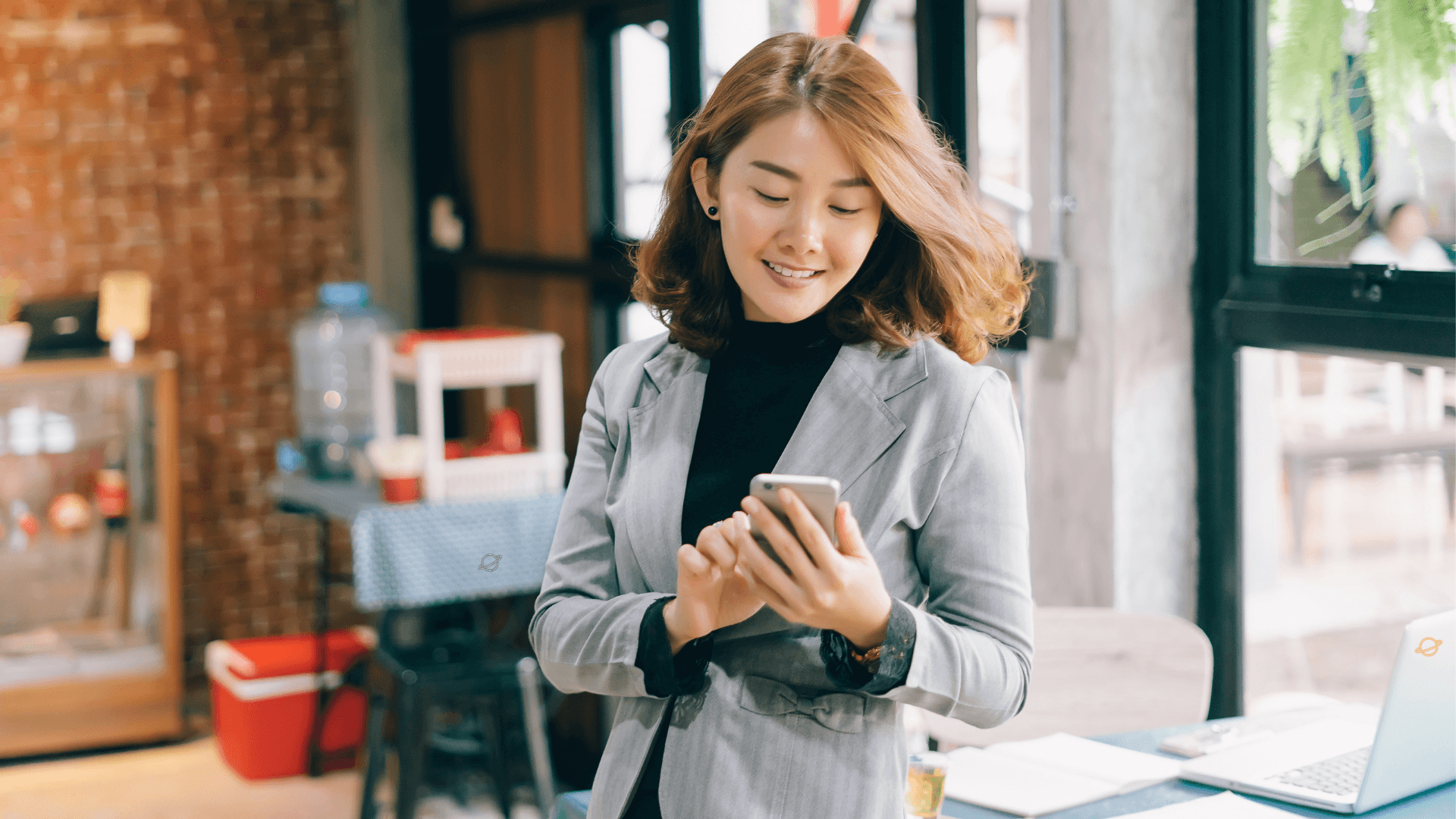 Woman texting to update CRM