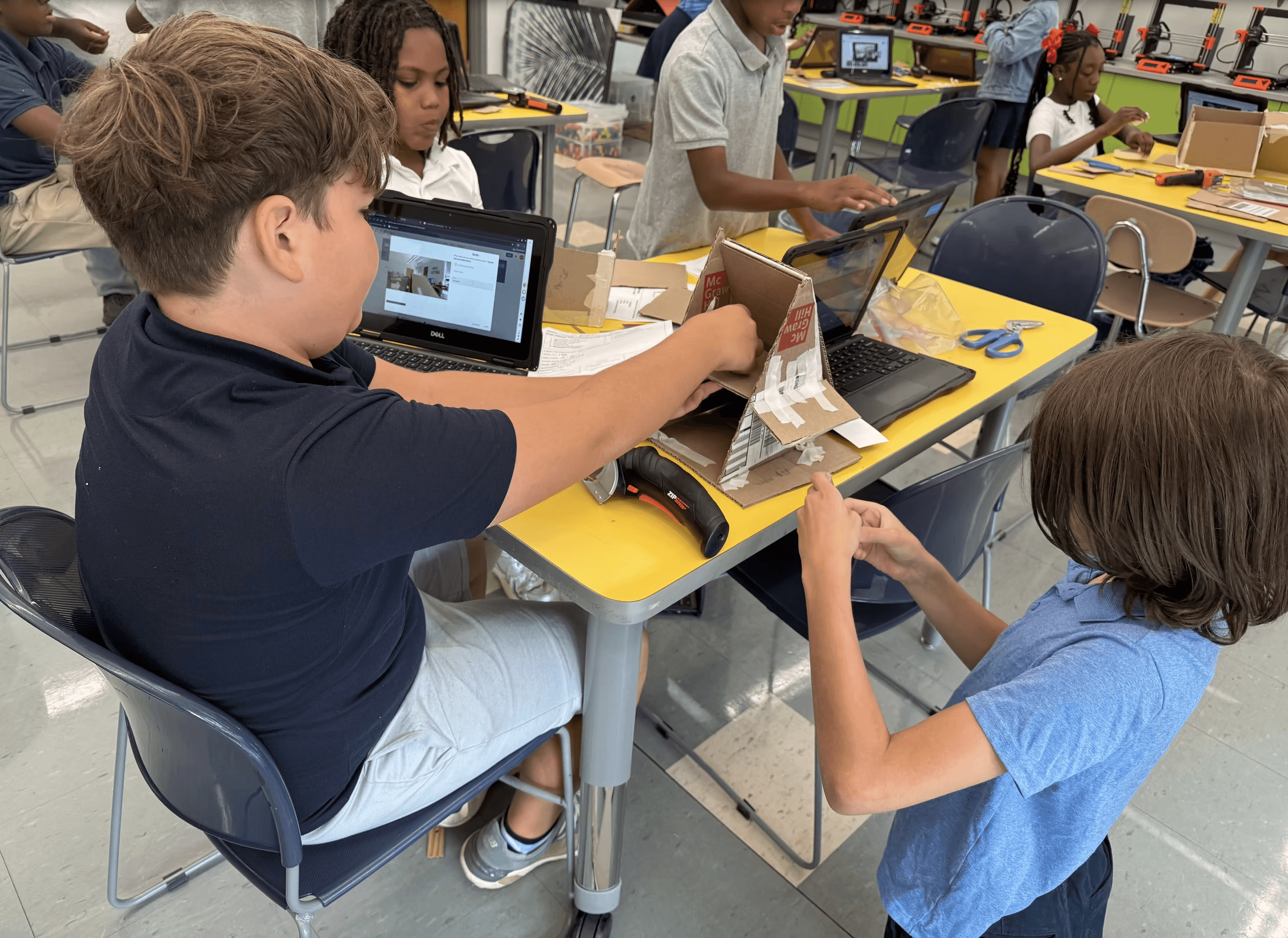 Students collaborating on an eLab project at Battle Academy.