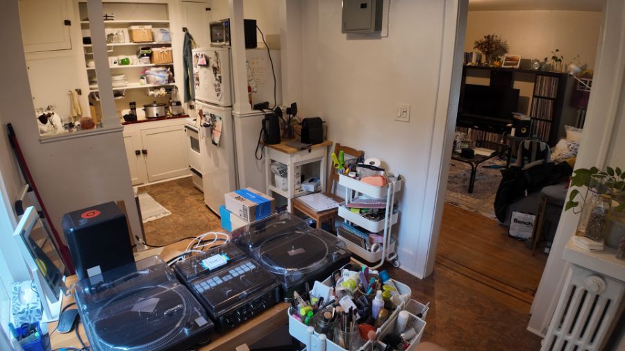 Macro of clear effervescent bubbles in water on a soft gray background—sparkling, minimal texture for clean skincare aesthetic.