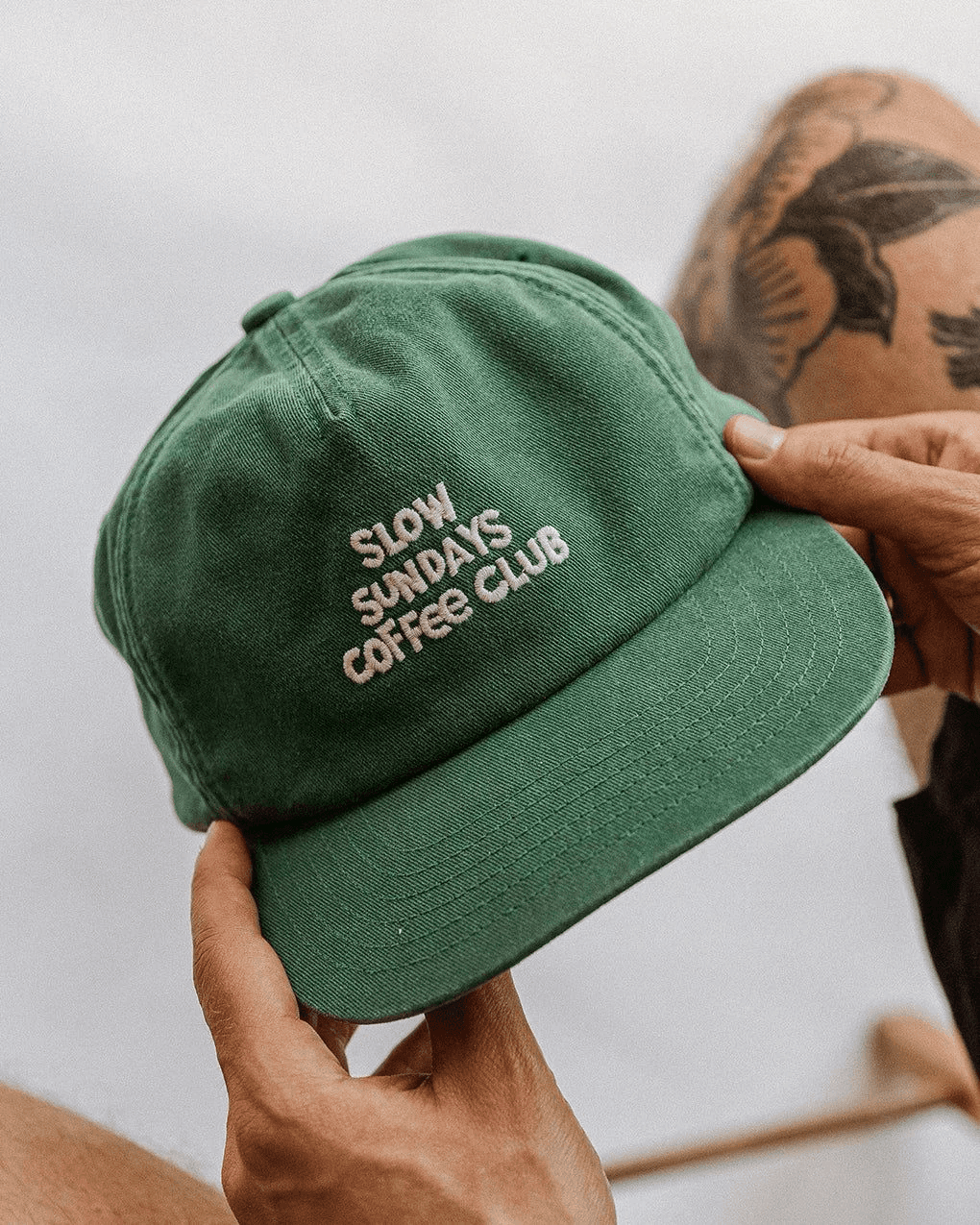 Green hat with text