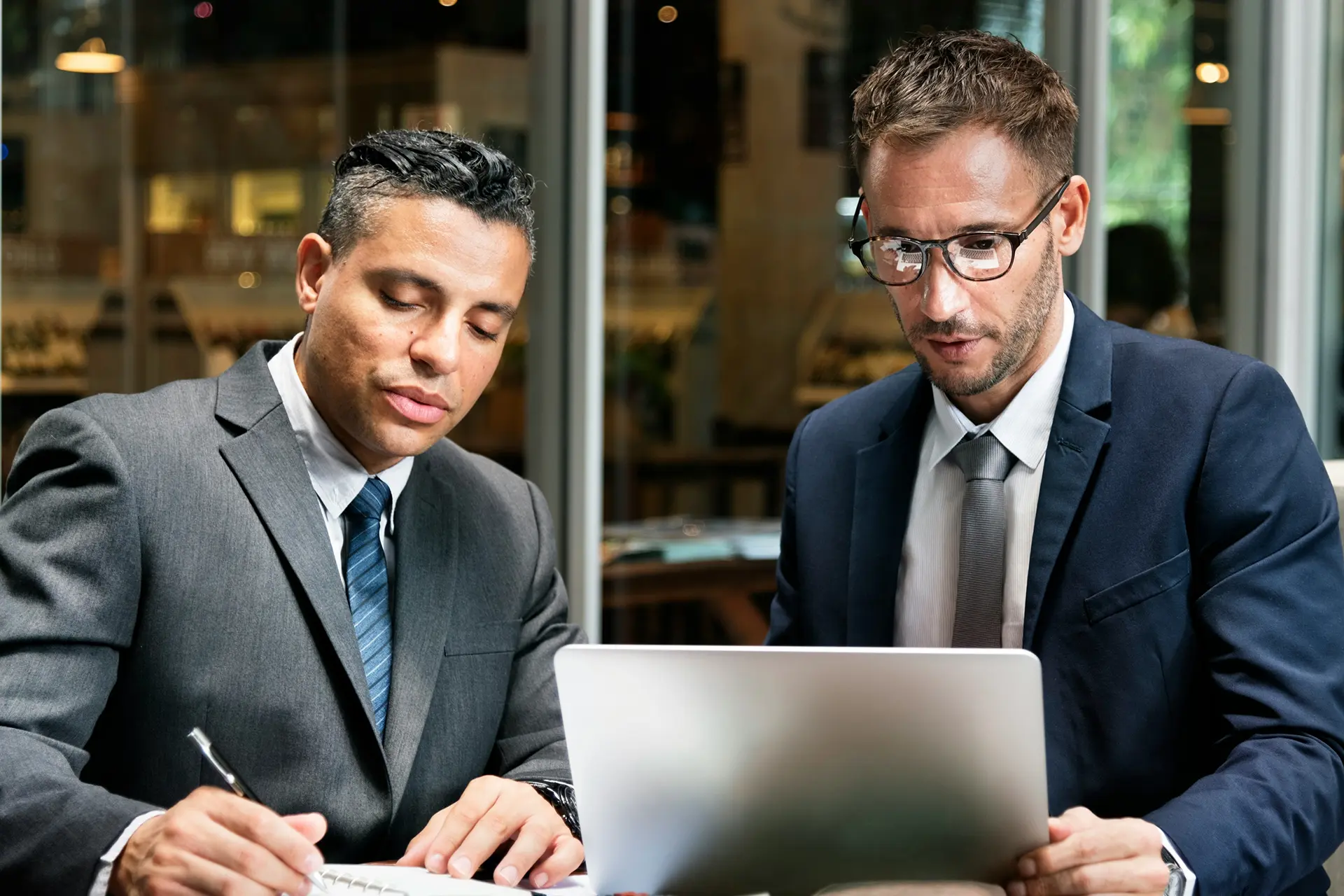 Two compliance experts discussing global guidelines 