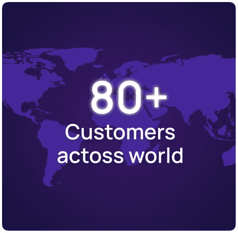 A modern home office with framed art and an aquarium.