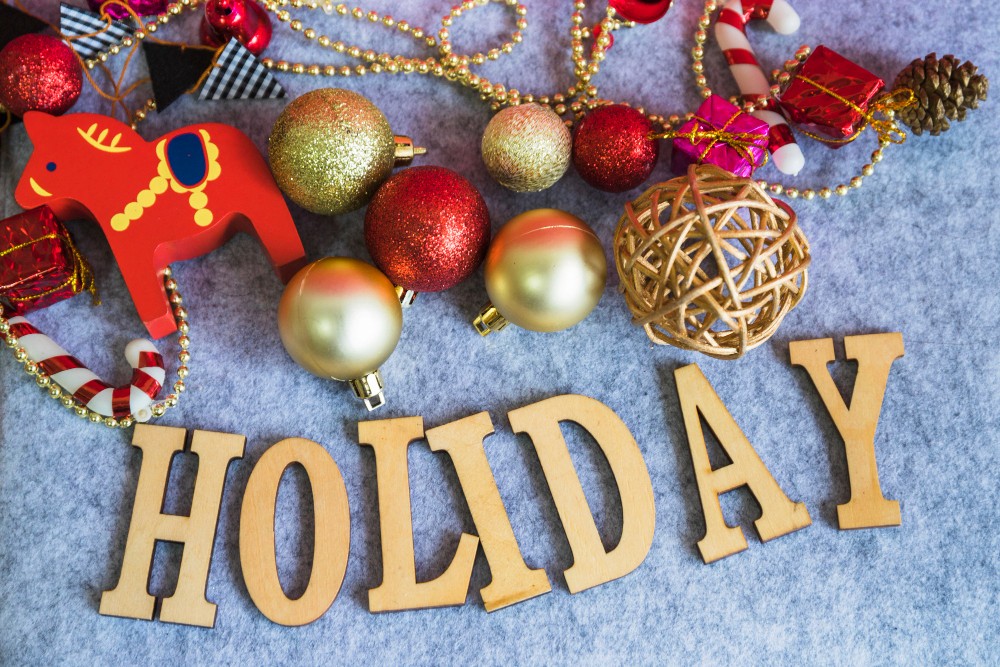 Holiday lettering from wood with baubles