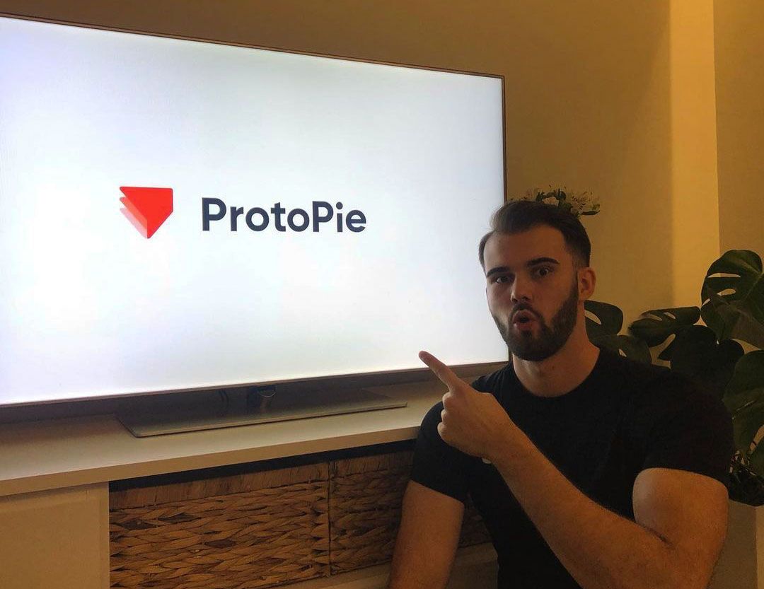 ProtoPie ambassador and ProtoPie logo on a tv screen