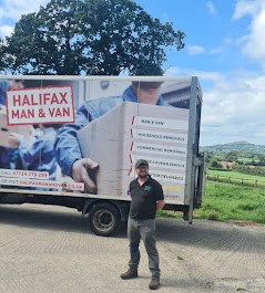 Steven Oldroyd, founder of VanHub UK, beside his Halifax Man and Van removal vehicle