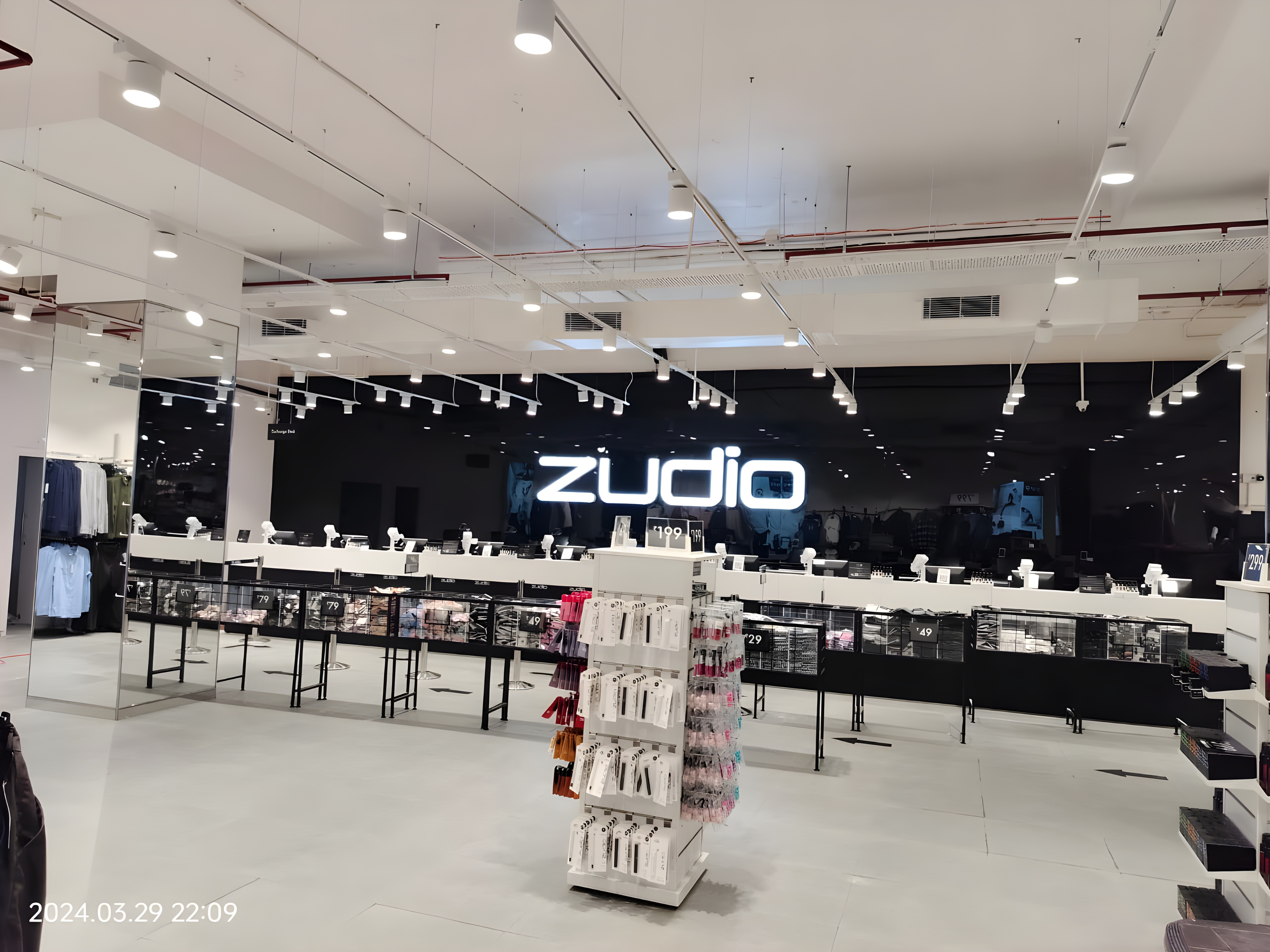 Zudio Rangoli Mall interior with clothing displays and ceiling lighting