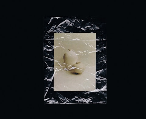 Minimal abstract artwork with layered paper texture