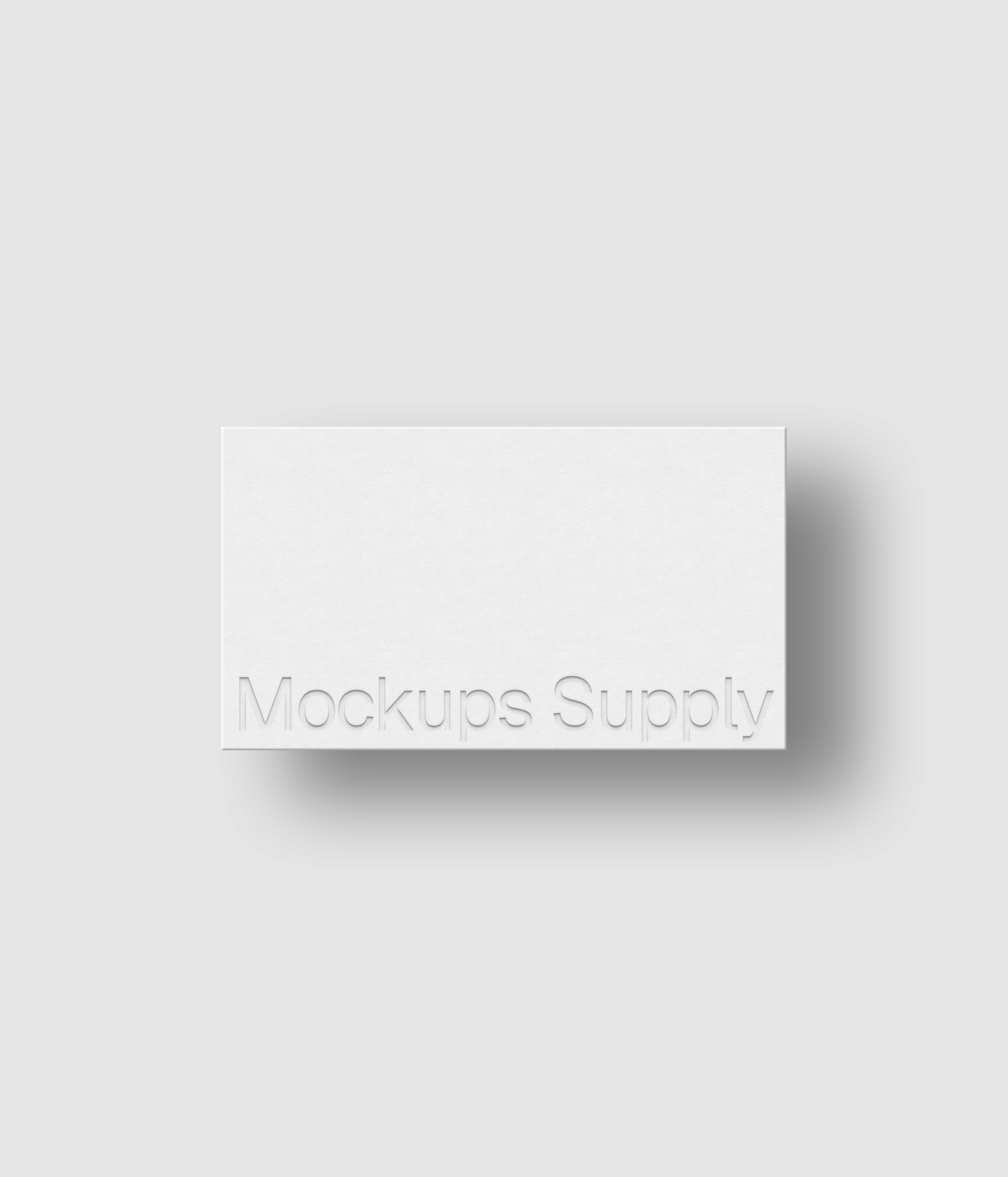 US Canada business card mockup landscape for Photoshop with shadow and debossed text effect, white card on white background, minimal branding and stationery presentation